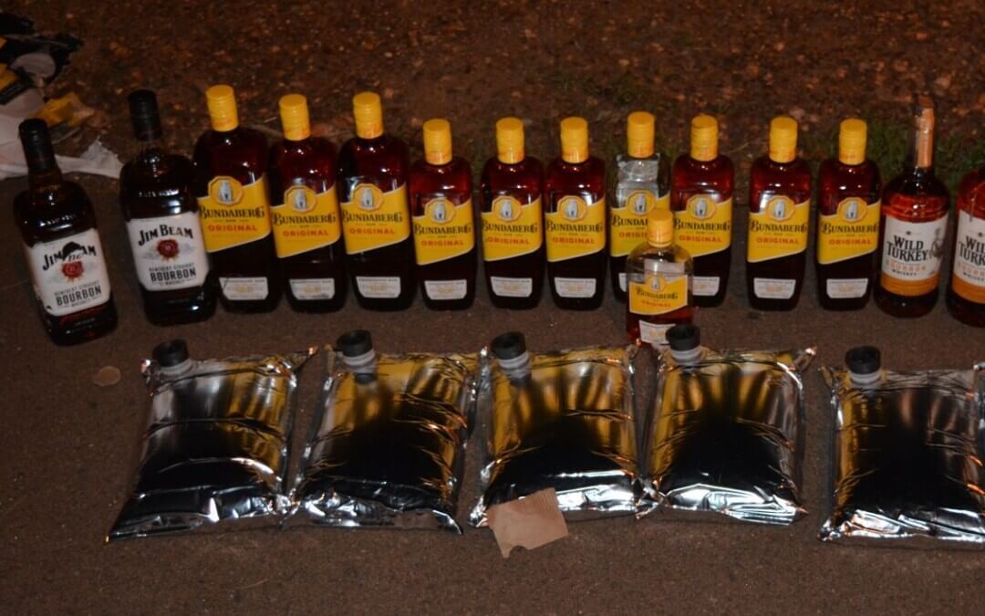 Police alleged four caught with drugs and illegal alcohol on flight into undisclosed NT destination