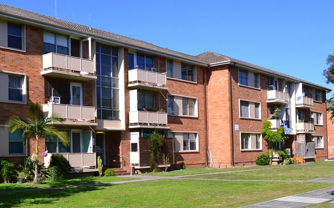 Government hands public housing to not-for-profits