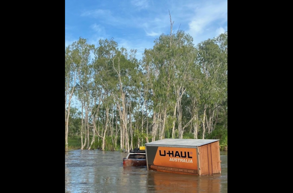 Driver rescued from remote river